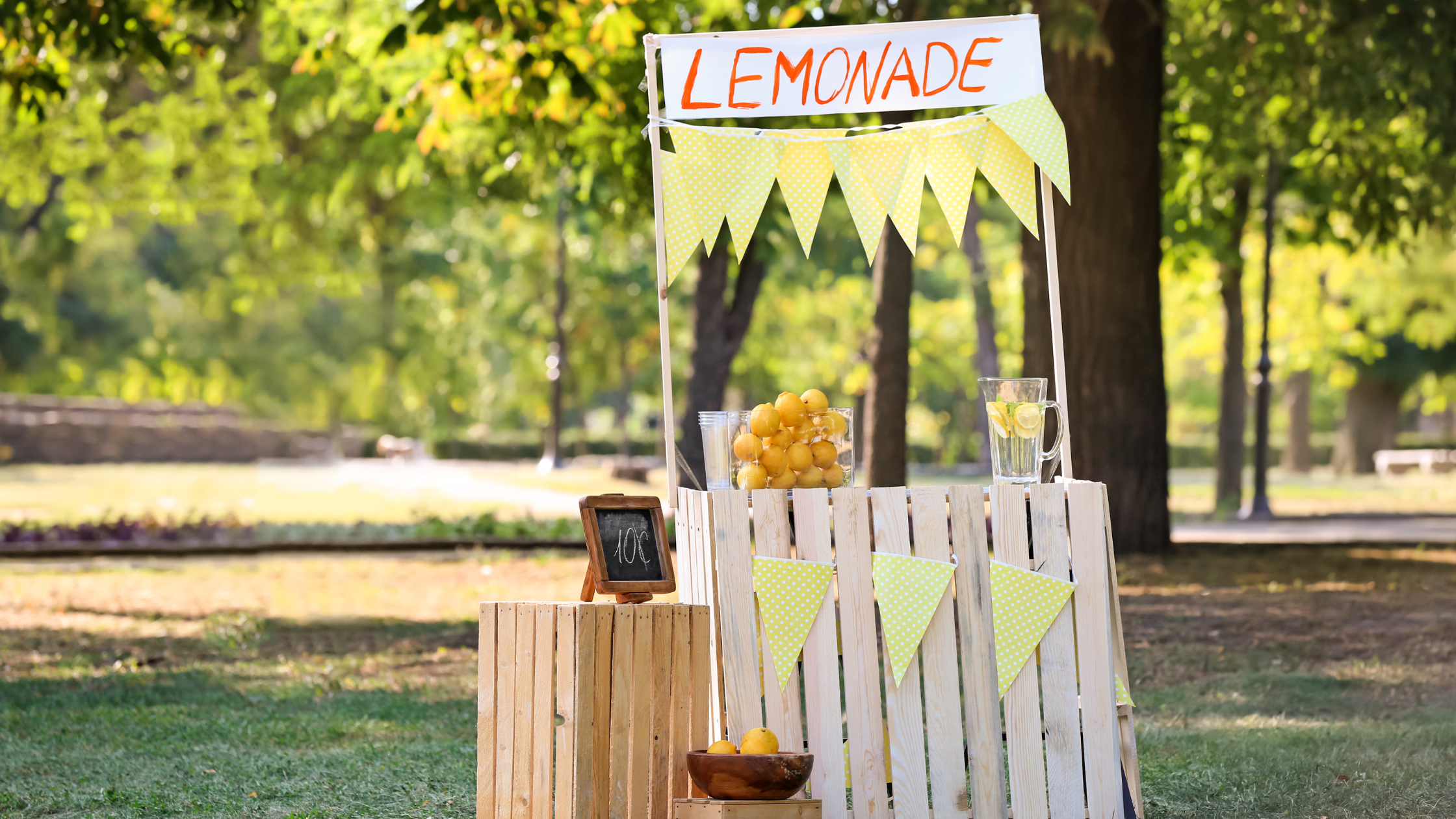 Lemonade stand with lemonade for sale for 10 cents